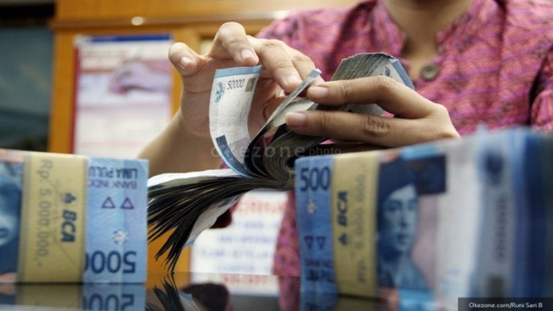 BI Tahan Suku Bunga, Rupiah Bisa Tembus Rp16.000 per USD (FOTO: MNC Media)
