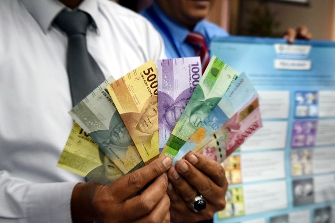 Simak Syarat dan Cara Tukar Uang Baru di Bank Via Aplikasi PINTAR BI. (Foto: MNC Media)  