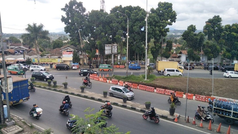 Cuaca Ekstrem Libur Natal, Jumlah Kendaraan Keluar Masuk Tol Padalarang Merosot. (Foto: Adi/MPI).