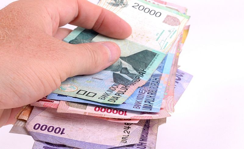 Uang Kembalian Diganti Permen, Awas Didenda Rp200 Juta. (Foto MNC Media)