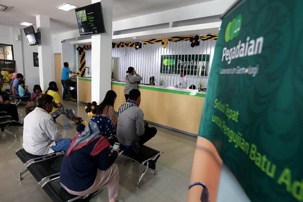 Kenali Syarat Gadai BPKB Motor di Pegadaian. (FOTO: MNC MEDIA)