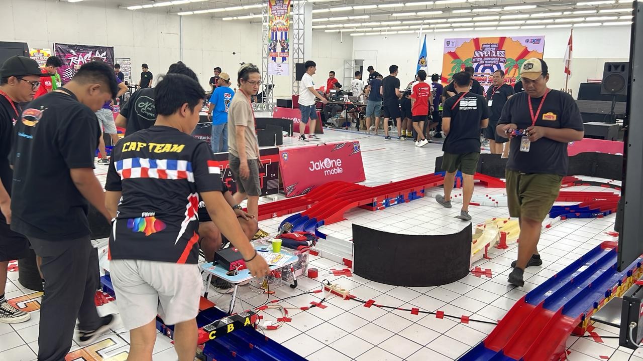 Genjot Perluasan Transaksi Non Tunai, Bank DKI Gandeng Komunitas Mini 4WD (foto: MNC media)