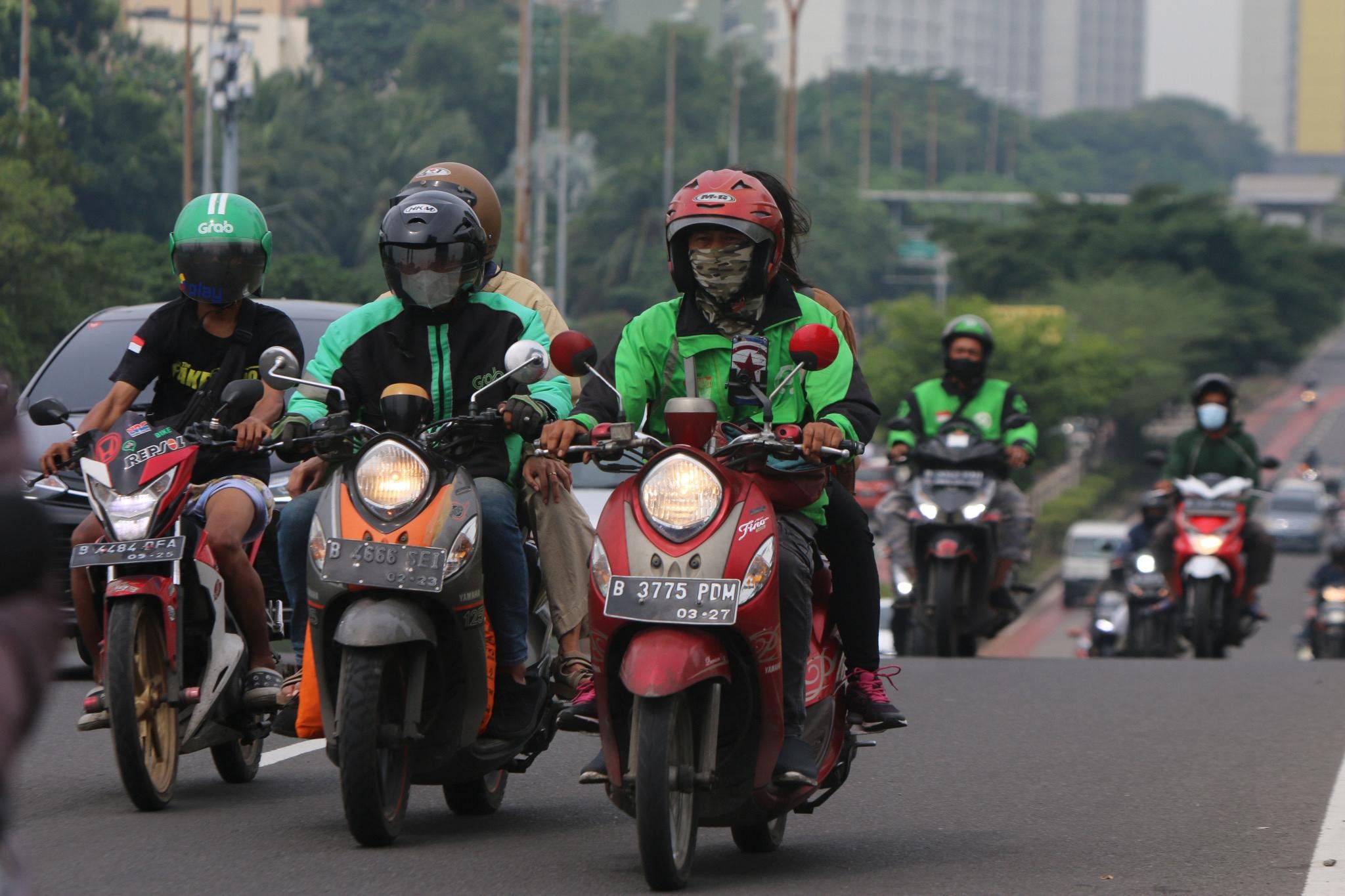 Komisi Ojol Dipangkas Jadi 8 Persen, Saham GRAB Terpeleset, GOTO Ikut Terseret. (Foto: MNC Media)
