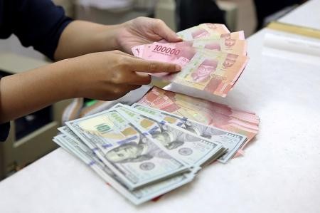 Rupiah Tembus Rp18.000 per Dolar AS, BI Perkuat Intervensi di Pasar Valas. (Foto: Ilustrasi)