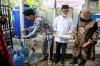 Jalankan Program Prioritas, Risma Sulap Air Keruh Jadi Air Siap Minum. (Foto: MNC Media)