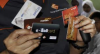 Kenali Cara Cek Saldo e-Money Mandiri Lewat OVO, Gojek, LinkAja, dan Dana. (FOTO : MNC MEDIA)