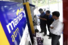 Inilah Cara Mudah Setor dan Tarik Tunai di ATM Mandiri. (FOTO : MNC MEDIA)