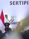 Jokowi Serahkan Tiga Ribu Sertifikat Hak Atas Tanah di Kabupaten Bandung. (Foto: MNC Media)