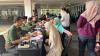 Meski Hujan, Masyarakat tetap Antusias Tukar Uang Baru di Istora Senayan. Foto: MNC Media.