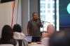 Chief Operating Officer IDX Channel, Masirom, memberi sambutan di IDX Channel ESG Workshop 2025. Foto: Dinar Fitra/iNews Media Group.