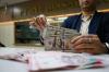 Rupiah Ditutup Melemah ke Rp17.409 per Dolar AS