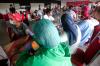 Antusias Warga Ikuti Vaksinasi Covid-19 di Terminal Kampung Rambutan
