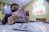 Cadangan Devisa Indonesia Akhir September Turun, Jadi 130,8 Miliar Dolar AS