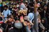 Warga Ramai-Ramai Saksikan Fenomena Gerhana Matahari Hibrida di Taman Ismail Marzuki