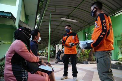 Tim Trenggana Satuan Polisi Pamong Praja Provinsi Jawa Timur ini menjadi ujung tombak pelayanan pekerja migran.