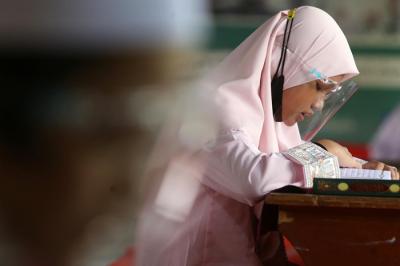 Uji Kompetensi atau Munaqosah Tartil Alquran Tingkat Pesantren Ilmu Alquran (PIQ) di Sekolah Khadijah Wonokromo Surabaya, Jawa Timur, Minggu (13/6/2021).