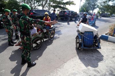 Serbuan Vaksinasi bagi masyarakat maritim di wilayah Pesisir Kabupaten Lamongan, Jawa Timur, Rabu (14/7/2021).