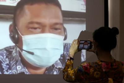 Terdakwa mantan Panitera Pengadilan Negeri Jakarta Utara, Rohadi menjalani sidang putusan secara virtual di Pengadilan Tipikor, Jakarta, Rabu (14/7/2021).
