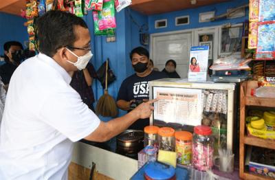 Direktur Utama Bank BTN Haru Koesmahargyo saat kunjungan kerja untuk memantau penyaluran Bansos dan Bantuan Subsidi Upah di wilayah Cikarang dan Karawang.