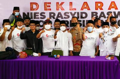 Relawan yang mengatasnamakan ANIES saat deklarasi Anies Baswedan for Presiden 2024 di Gedung Joeang 45, Menteng, Jakarta Pusat, Rabu (20/10/2021).