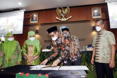 Kerja sama dalam menghadirkan transformasi digital guna menyediakan kemudahan bertranskasi masyarakat atas akses layanan keuangan digital berbasis Syariah.