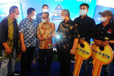 Akad Kredit Massal KPR BP2BT di Perumahan Dream Land II, Kabupaten Banyuasin, Palembang, Sumatera Selatan, Sabtu (20/11/2021).