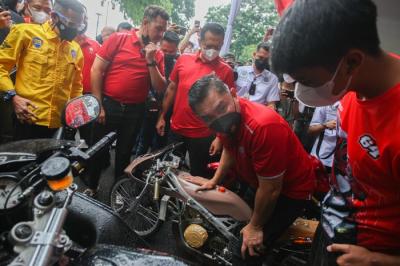 treet Race Polda Metro Jaya di Jalan Inspeksi Kali Ancol, Jakarta Utara, Minggu (16/1/2022).