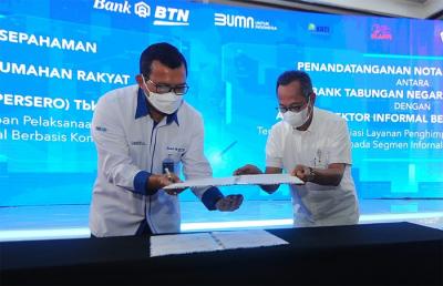 Penandatanganan kerja sama tentang Penyusunan Kajian Dalam Rangka Persiapan Pelaksanaan Pembiayaan Perumahan Kepada Segmen Pekerja Informal Berbasis Komunitas.