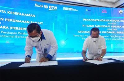Penandatanganan kerja sama tentang Penyusunan Kajian Dalam Rangka Persiapan Pelaksanaan Pembiayaan Perumahan Kepada Segmen Pekerja Informal Berbasis Komunitas.