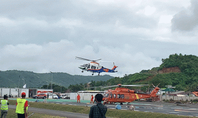Ketiga helikopter sudah terlihat parkir di area luar sirkuit.