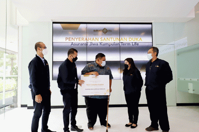 Penyerahan klaim kepada ahli waris di MNC Financial Center, Jakarta, Jumat (11/3/2022).