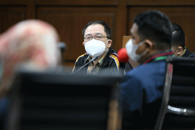 Teddy Tjokrosapoetro menjalani sidang di Pengadilan Tipikor, Jakarta, Rabu (23/3/2022).
