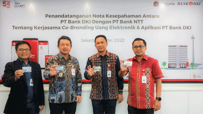 Penandatanganan Nota Kesepahaman antara PT Bank DKI dengan PT Bank NTT tentang kerja sama co-branding uang elektronik dan aplikasi PT Bank DKI di Jakarta.