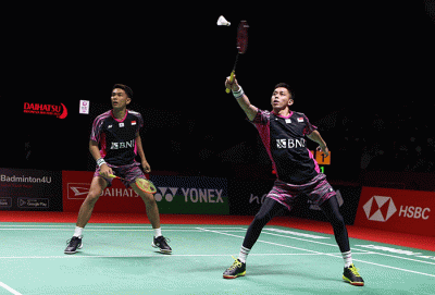 Fajar Alfian dan Muhammad Rian Ardianti dalam pertandingan Final Ganda Putra Daihatsu Indonesia Masters 2022 melawan Liang Wei Keng dan Wang Chang.