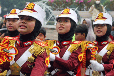Aksi sejumlah polisi cilik (Pocil) di kawasan Car Free Day (CFD) kawasan Bundaran HI, Jakarta, Minggu (3/7/2022).