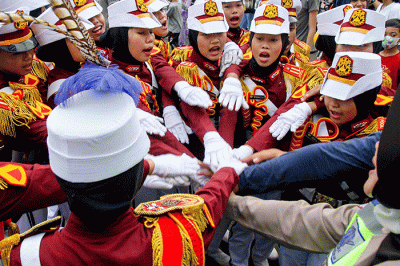Aksi sejumlah polisi cilik (Pocil) di kawasan Car Free Day (CFD) kawasan Bundaran HI, Jakarta, Minggu (3/7/2022).