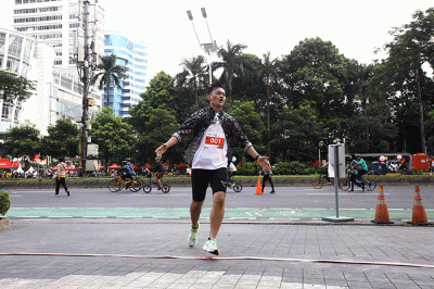 Staf Khusus Menteri BUMN Arya Sinulingga membuka ajang Road to IFG Labuan Bajo Marathon 2022 di kawasan Car Free Day (CFD) Jl.Jend Sudirman, Jakarta.
