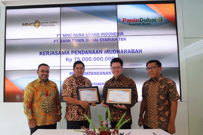 Penandatanganan kerja sama pembiayaan Mudharabah sebesar Rp75 miliar antara PT MNC Guna Usaha dengan PT Bank Panin Dubai Syariah Tbk (PNBS).
