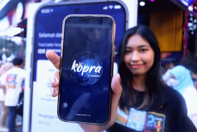 Peluncuran layanan Kopra Mobile App di sela-sela puncak peringatan HUT ke-24 Bank Mandiri pada Mandiri Karnaval 2022, di Senayan, Jakarta.