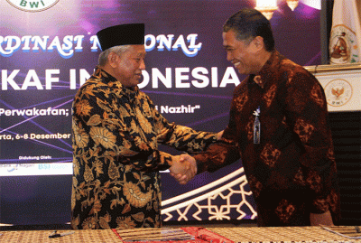 Penandatanganan kerja sama penerimaan wakaf uang di Jakarta, Rabu (7/12/2022).