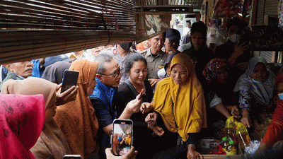 Menteri Perdagangan Zulkifli Hasan saat meninjau Pasar Natar di Kabupaten Lampung Selatan, Lampung, Rabu (28/12/2022).