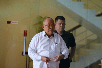 Direktur Utama PT Asabri Wahyu Suparyono usai menjalani pemeriksaan di Gedung Merah Putih KPK Jakarta, Selasa (14/3/2023).