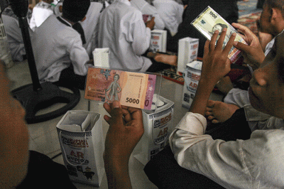Ratusan santri mengikuti kegiatan Semarak Rupiah Ramadan dan Berkah idul Fitri (SERAMBI) Kantor Perwakilan Bank Indonesia Provinsi Sumatera Selatan.