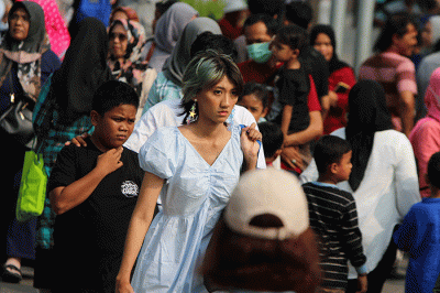 Jelang akhir libur lebaran dan libur peringatan hari buruh Pengunjung memadati Kawasan Kota Tua, Jakarta, Senin (1/5/2023).