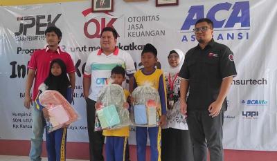 Komunitas wartawan JPEK didukung OJK menggandeng Industri Keuangan non bank menggelar CSR dalam rangka meningkatkan literasi keuangan bagi siswa Sekolah Dasar.
