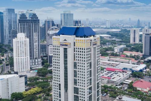 Mandiri (BMRI) Optimistis Salurkan Kredit di Tengah Ketidakpastian Global