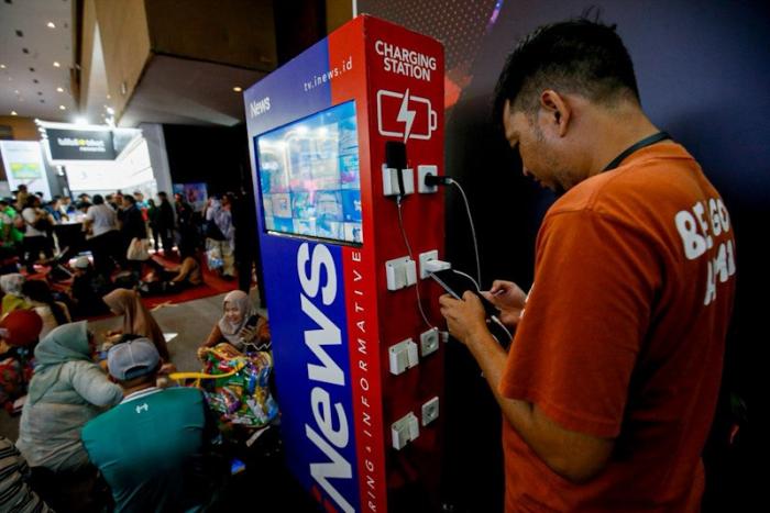 Booth iNews Media Group (IMG) menjadi salah satu daya tarik dalam gelaran Jakarta Fair 2026