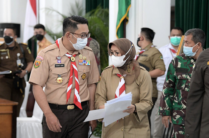 Gubernur Jawa Barat Ridwan Kamil saat menghadiri Rapat Komite Kebijakan Penanganan Covid-19 dan Pemulihan Ekonomi Daerah, di Bandung, Rabu (14/4/2021).
