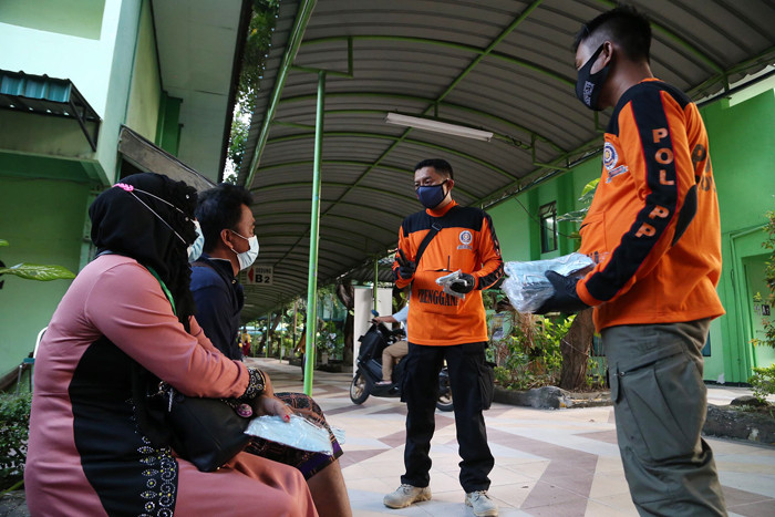 Tim Trenggana Satuan Polisi Pamong Praja Provinsi Jawa Timur ini menjadi ujung tombak pelayanan pekerja migran.
