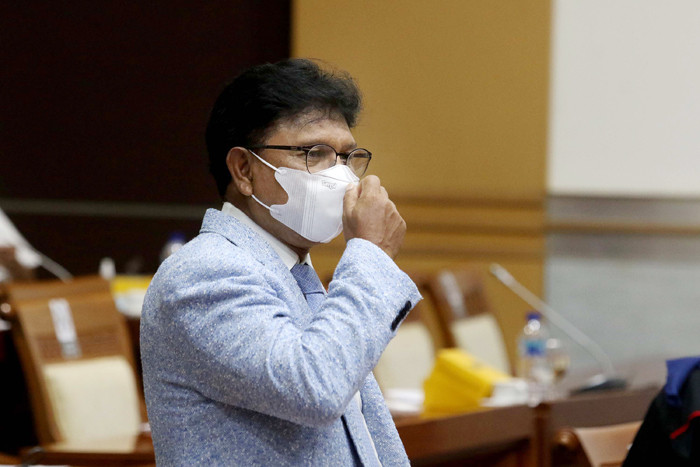 Menteri Komunikasi dan Informatika Johnny G Plate saat mengikuti rapat kerja dengan Komisi I DPR di Kompleks Parlemen Senayan, Jakarta, Senin (7/6/2021).